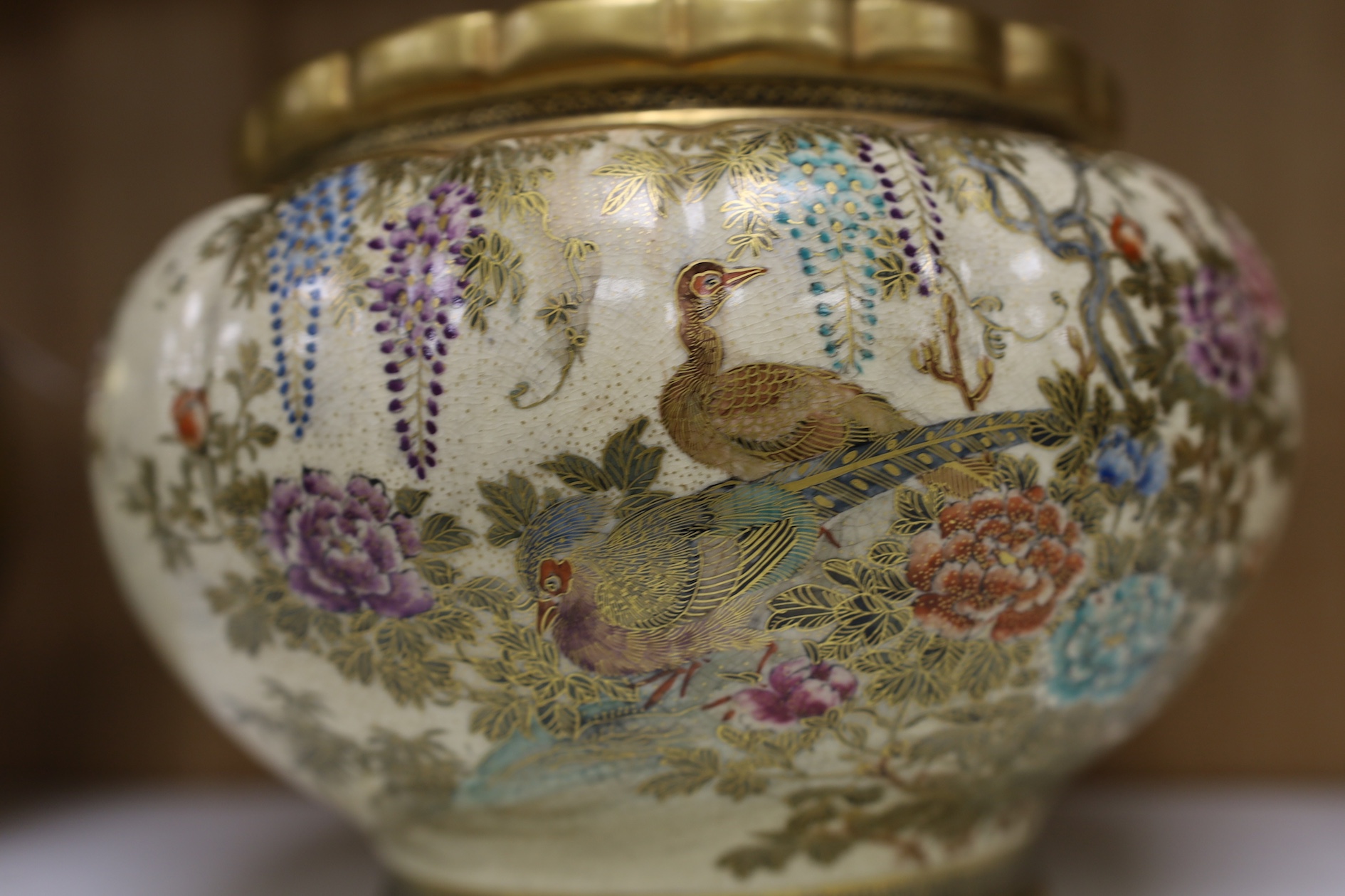 A Japanese Satsuma large bowl, 15cm high. Condition - heavily stain inside some grazing to lower rim and gilt scuffed on top rim of bowl